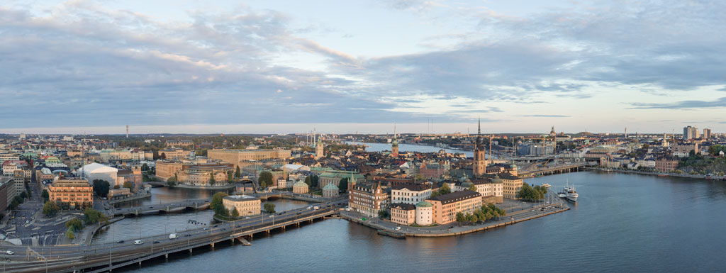 Vy över Vega samt man med skjorta